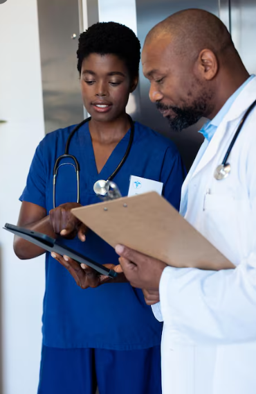 Doctor and nurse consulting on patient care